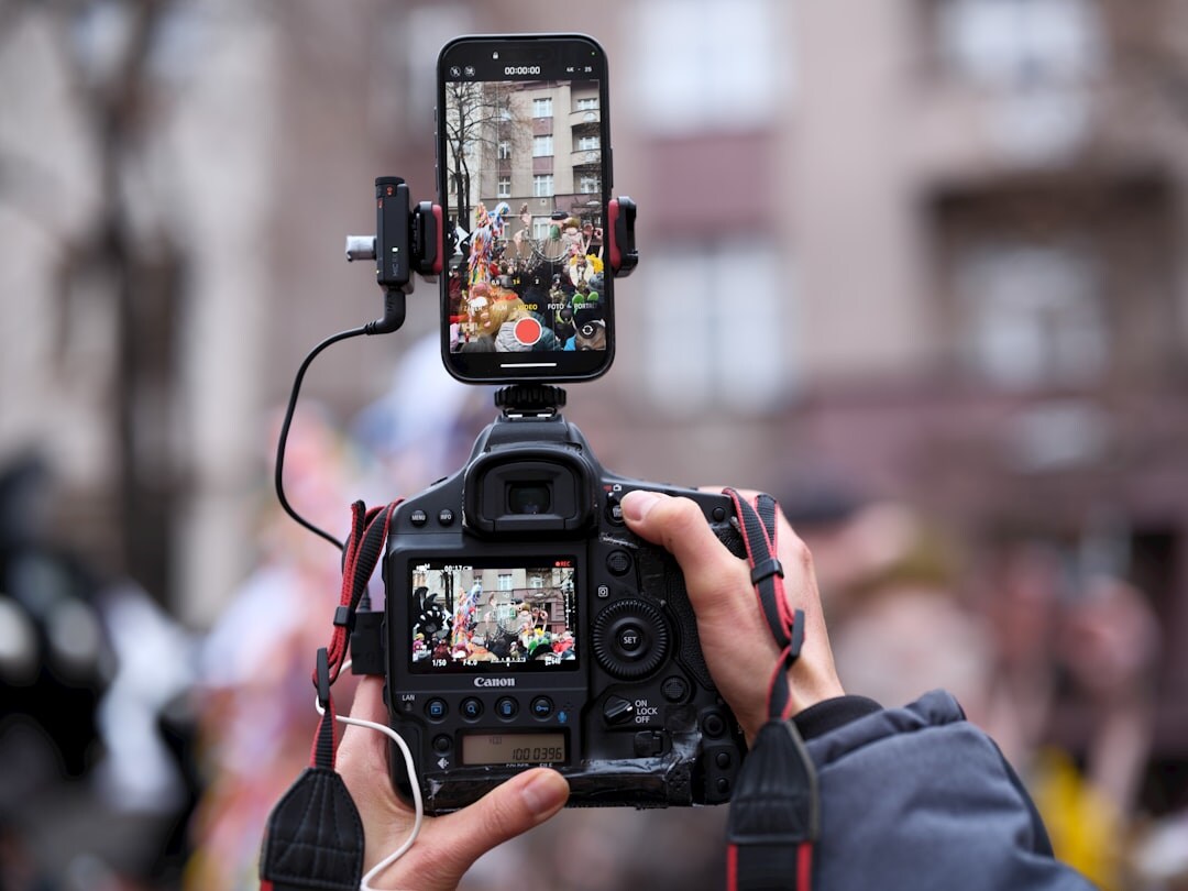 Journalist filming a live video report with a smartphone rig in the city